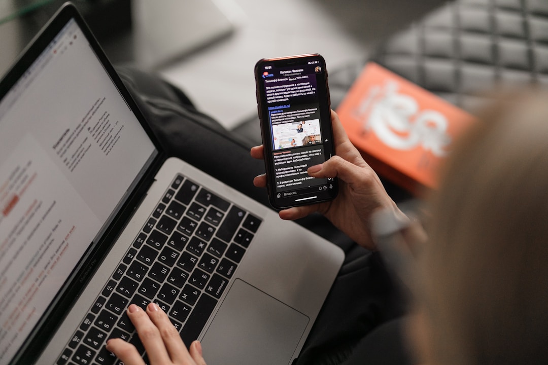 Individual using a smartphone to browse a website about the rise of nonprofit text platform services in the digital realm.